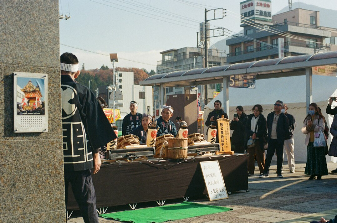 Japanese seniors enjoying tea and conversation at a community gathering