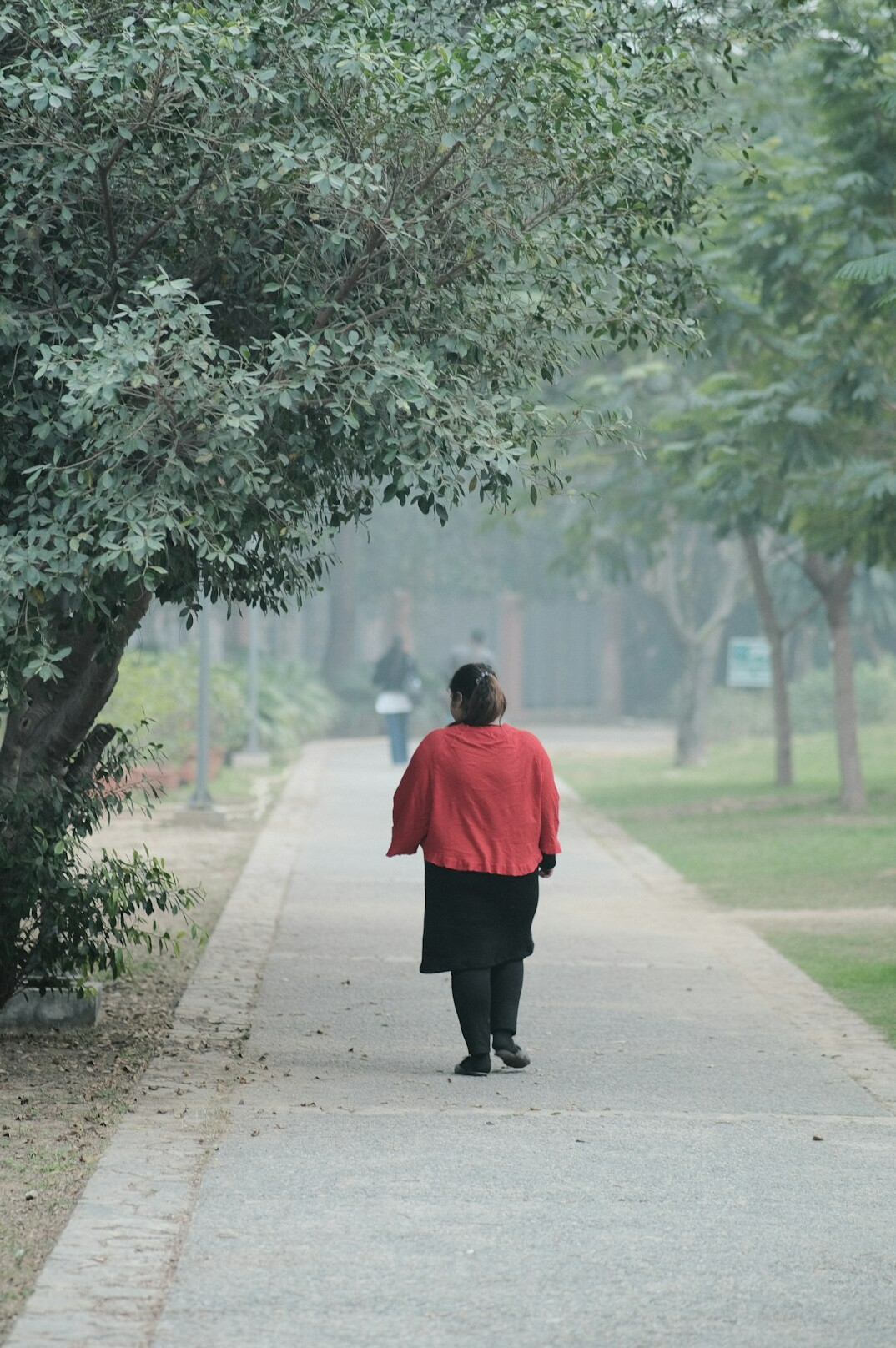 senior man walking in park
