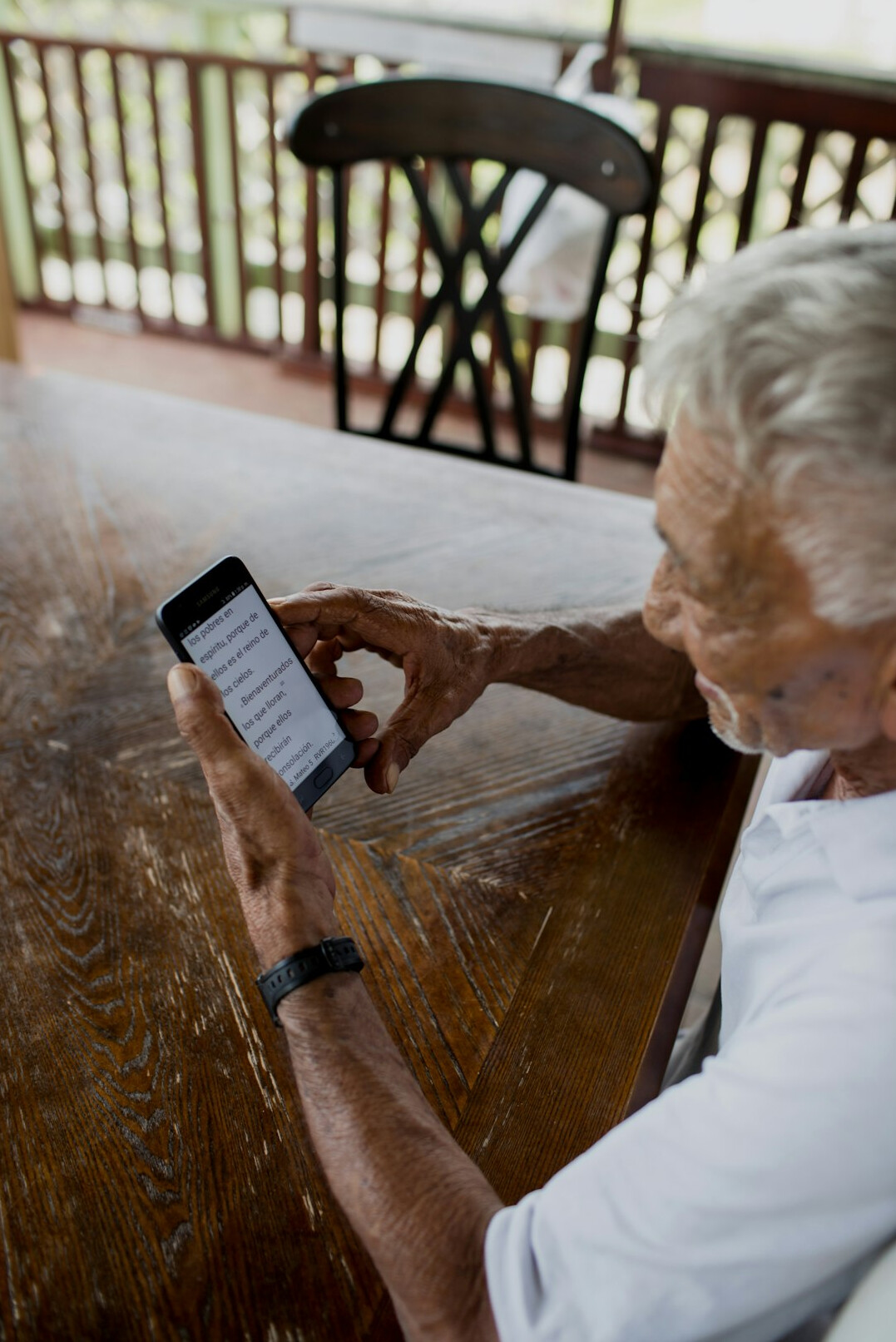 senior using smartphone